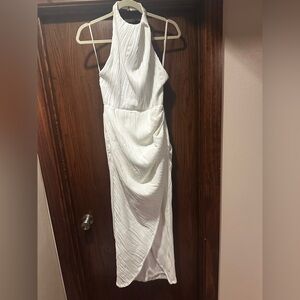 Never worn. Bought for my wedding rehearsal.